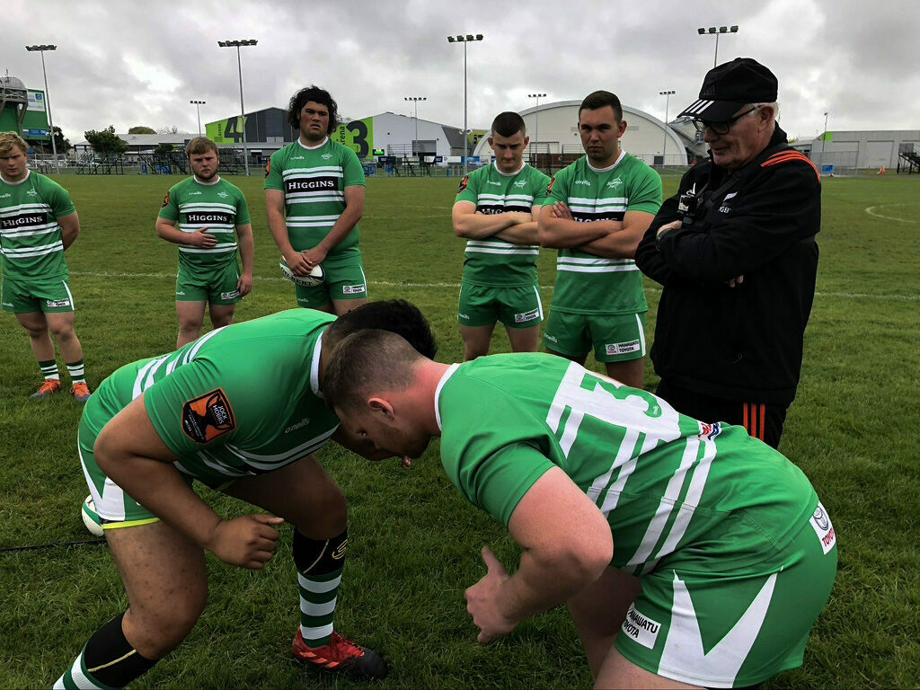 Coach instructing squad