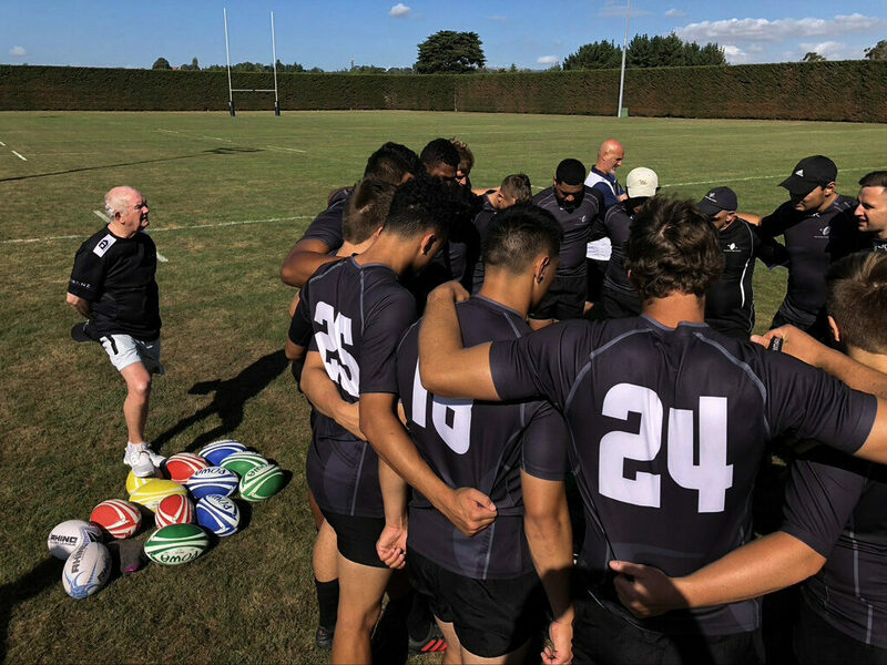 Coach addressing team huddle